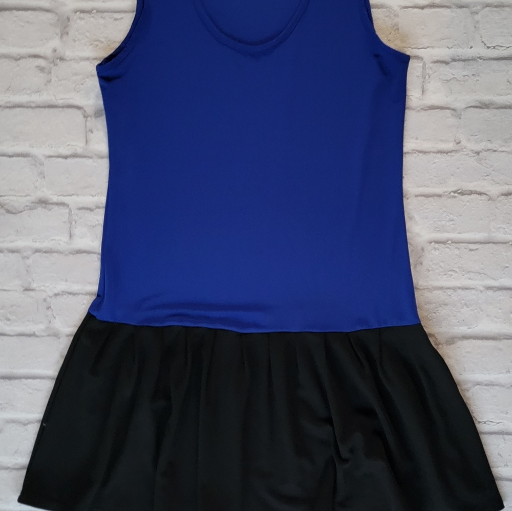 Dots Blue And Black Peplum top Sz M with drop waist sleeveless